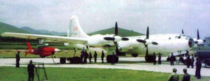 File:Tu-4 with BQM-34 underwing.jpg
